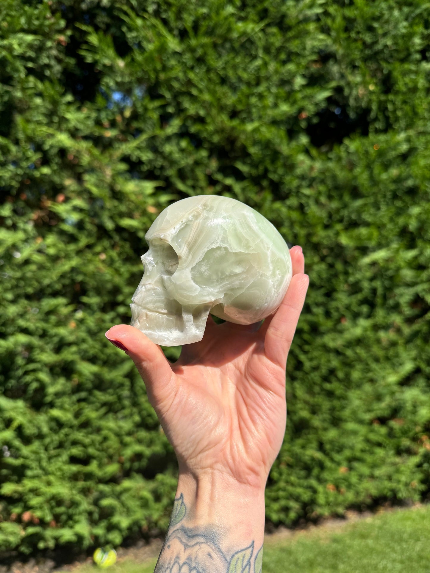 Banded Green Calcite Skull Carving (4.25")