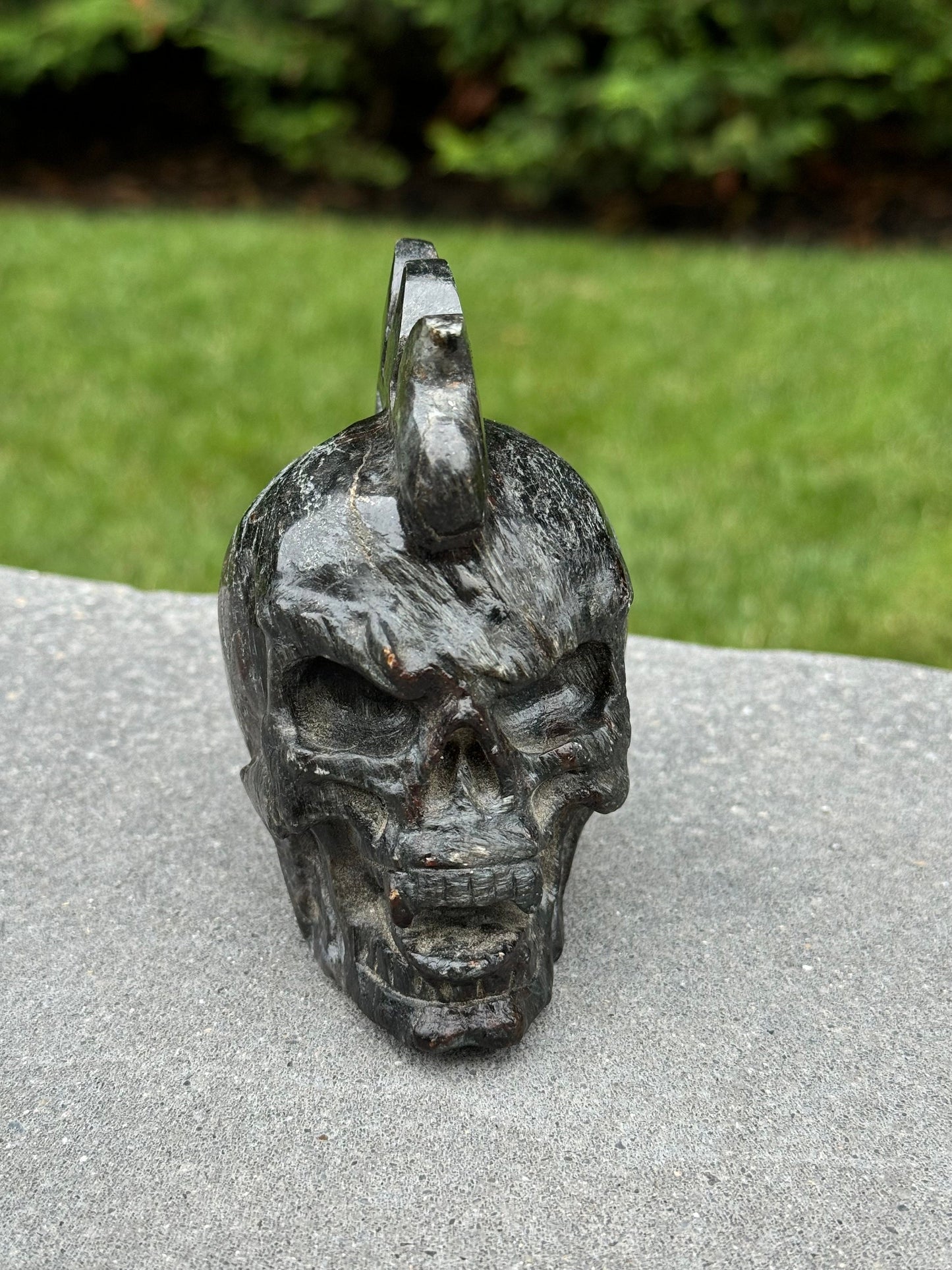 Garnet & Astrophyllite Mohawk Skull Carving (3.45")