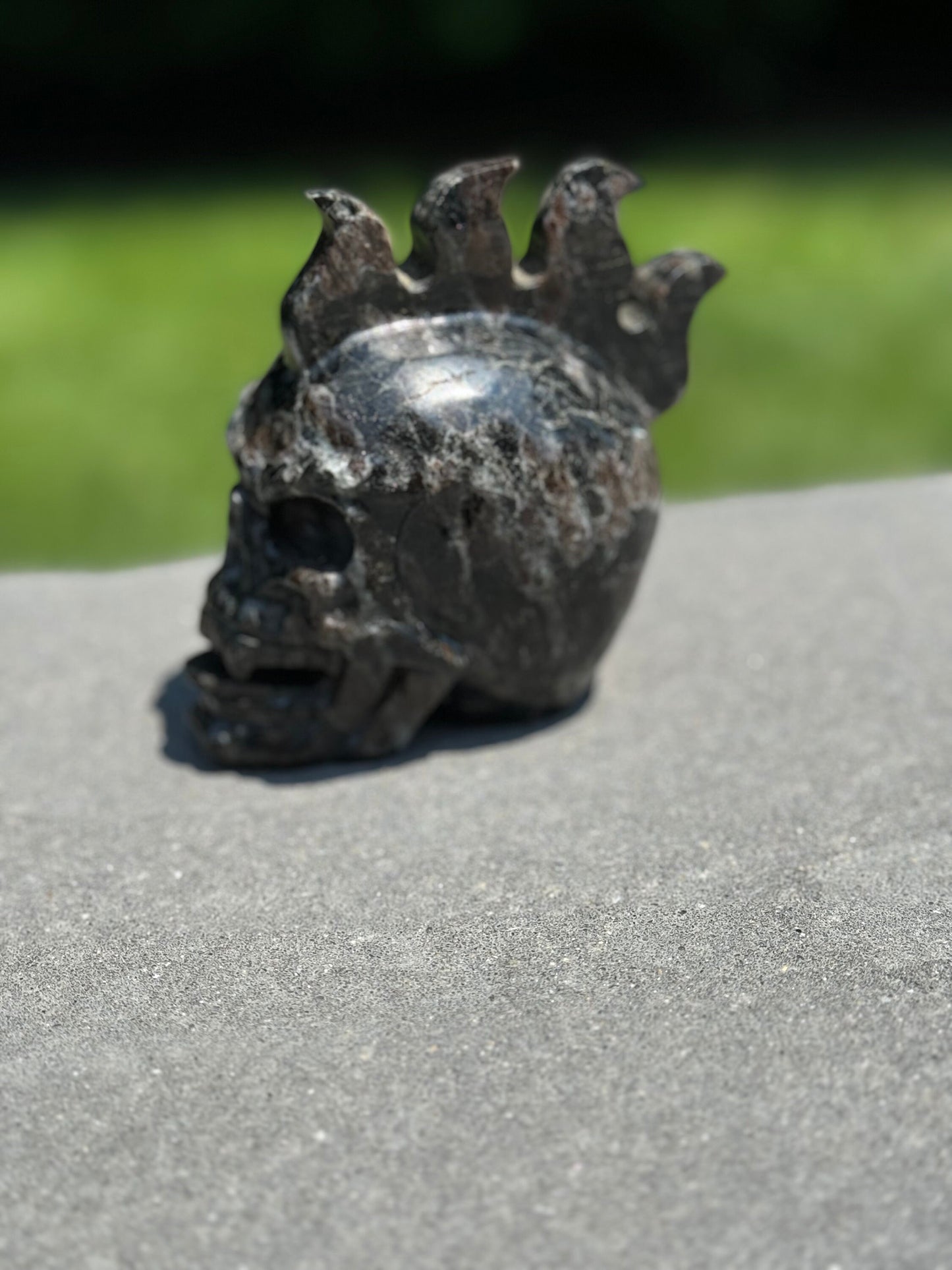 Garnet Astrophyllite Skull Carving (3.45")