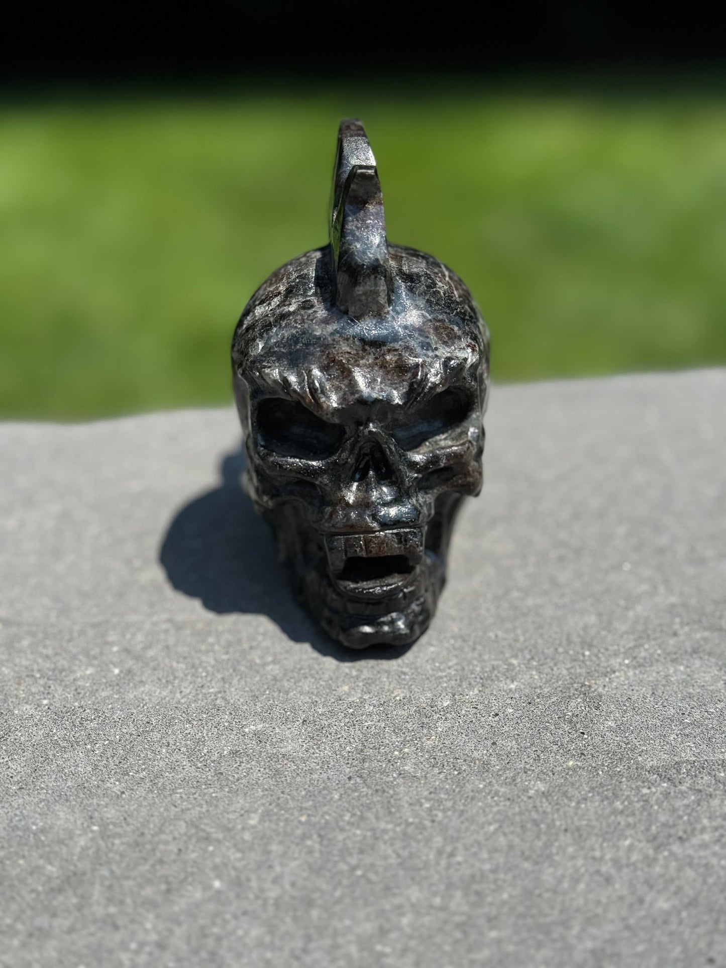 Garnet Astrophyllite Skull Carving (3.45")