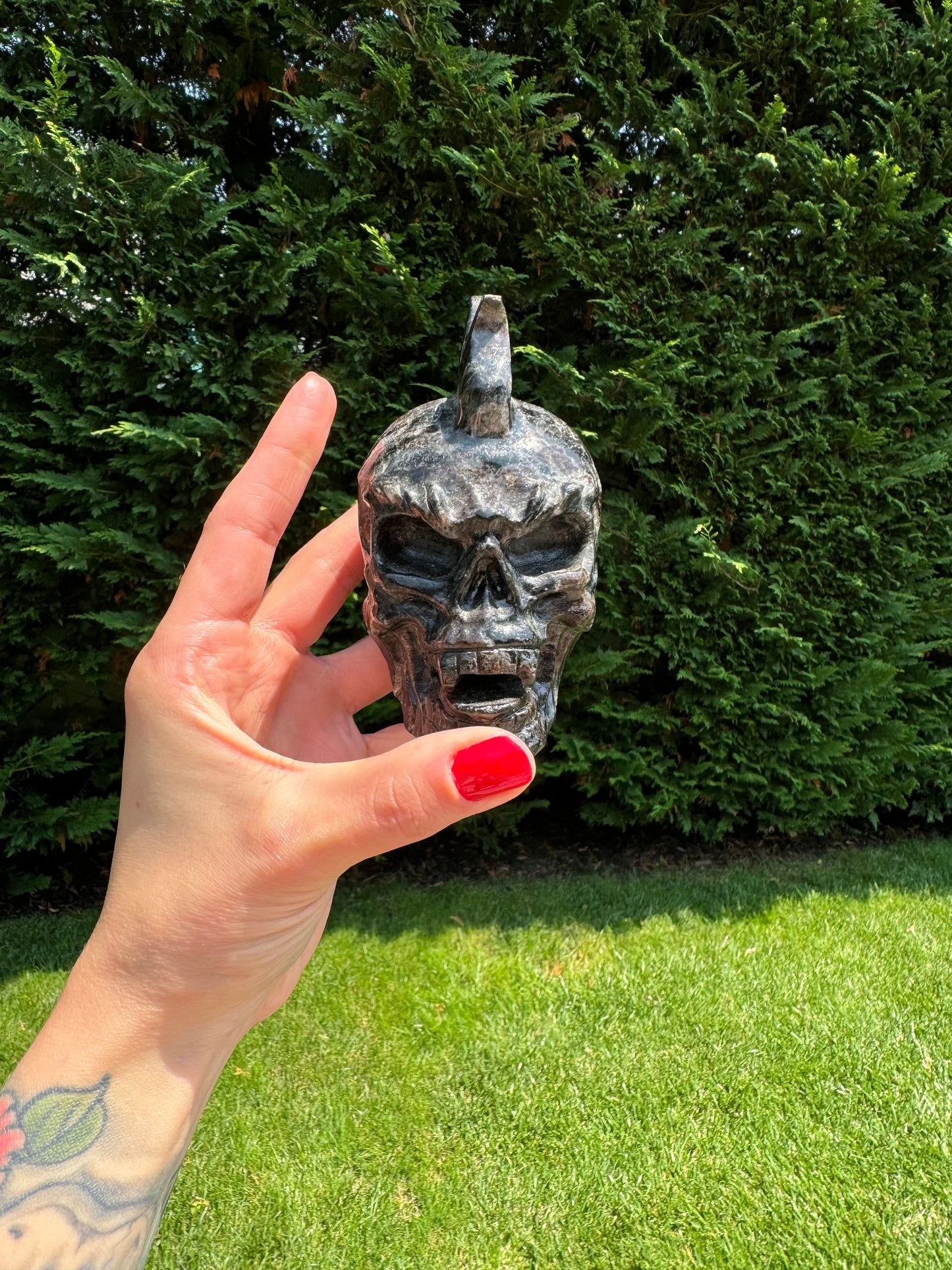 Garnet Astrophyllite Skull Carving (3.45")