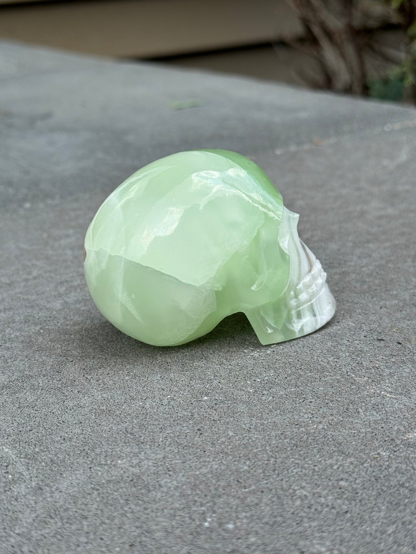 Banded Green Calcite Skull Carving