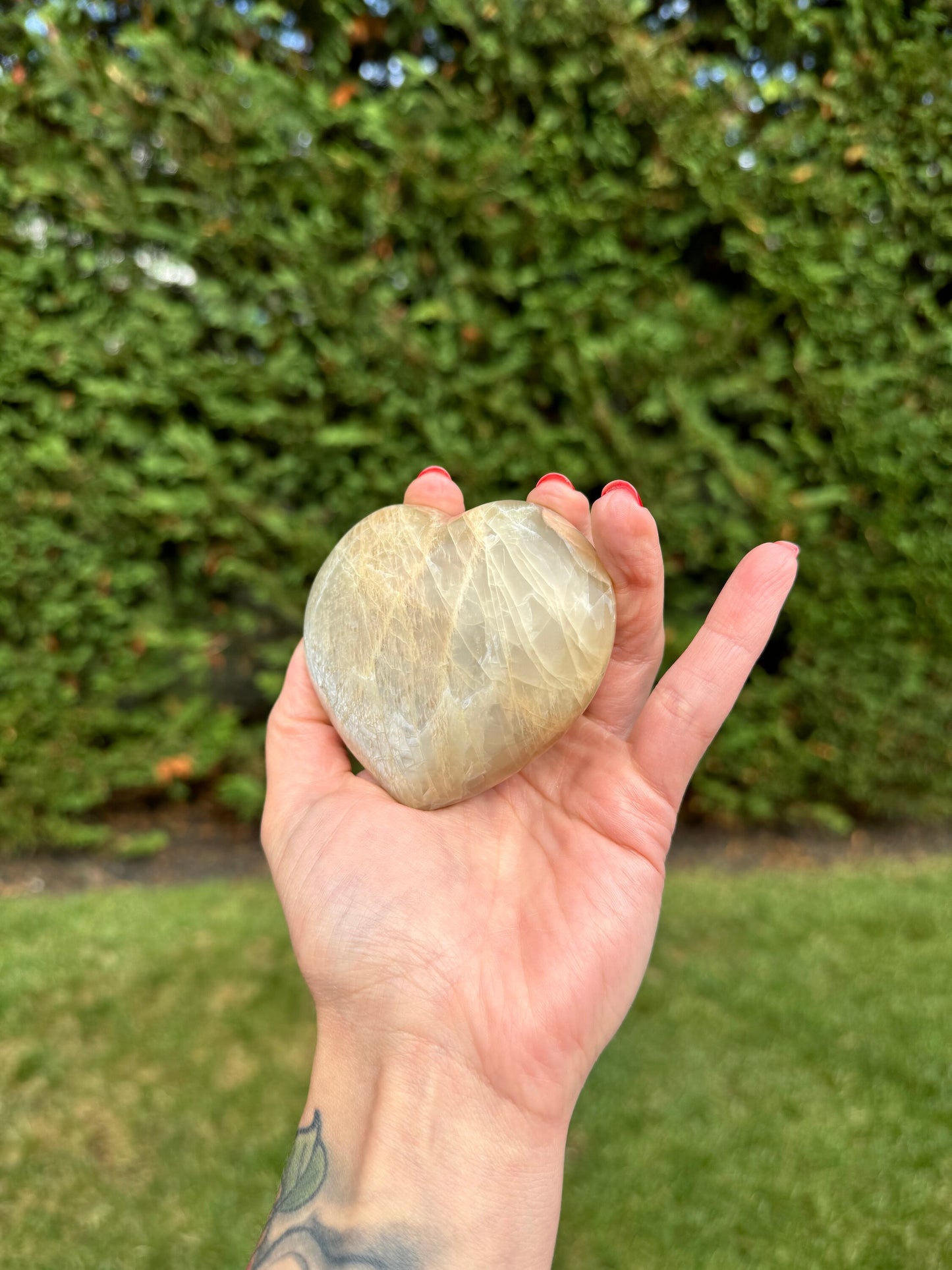 Flashy Peach Moonstone Heart Carving