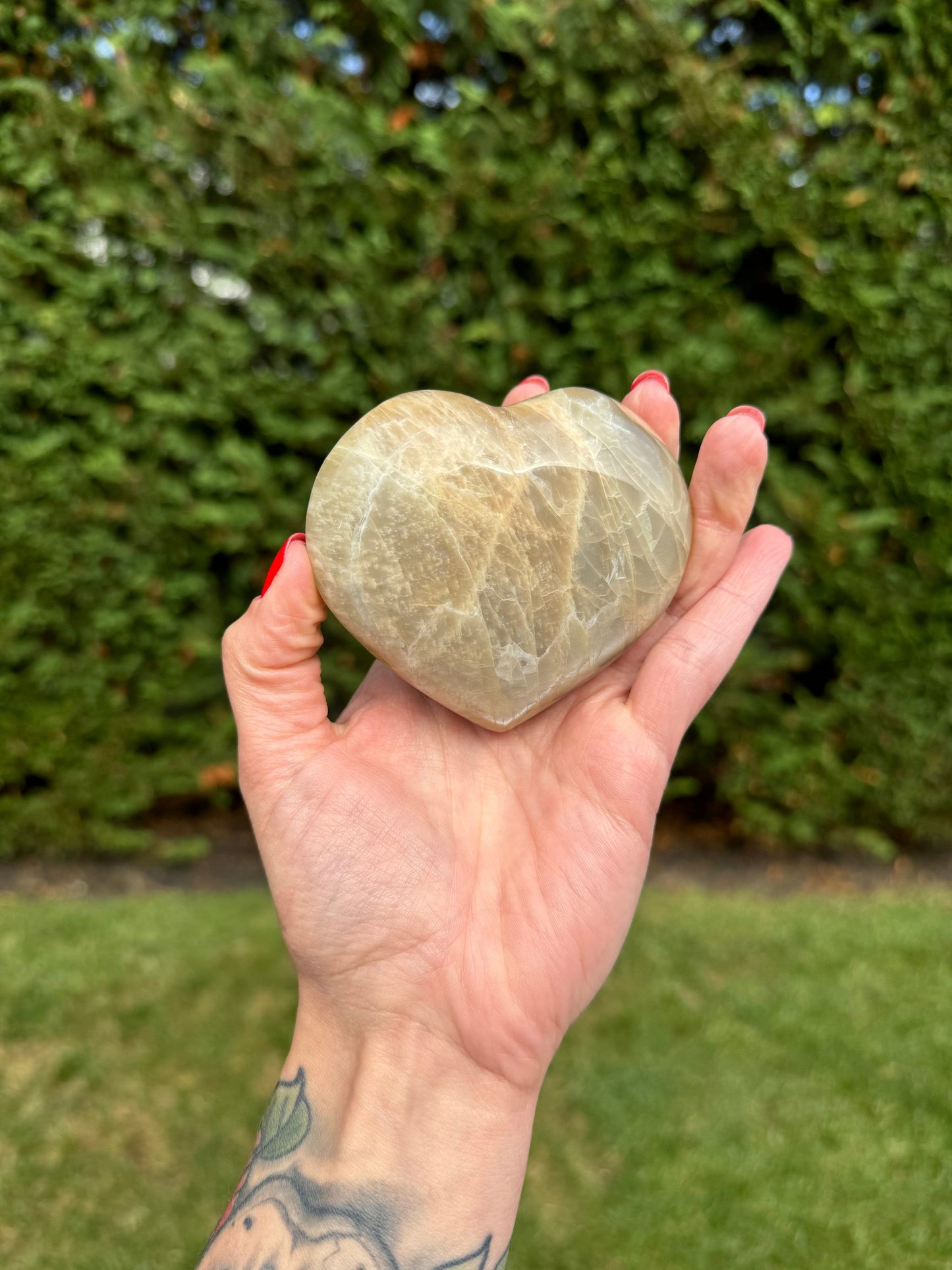 Flashy Peach Moonstone Heart Carving