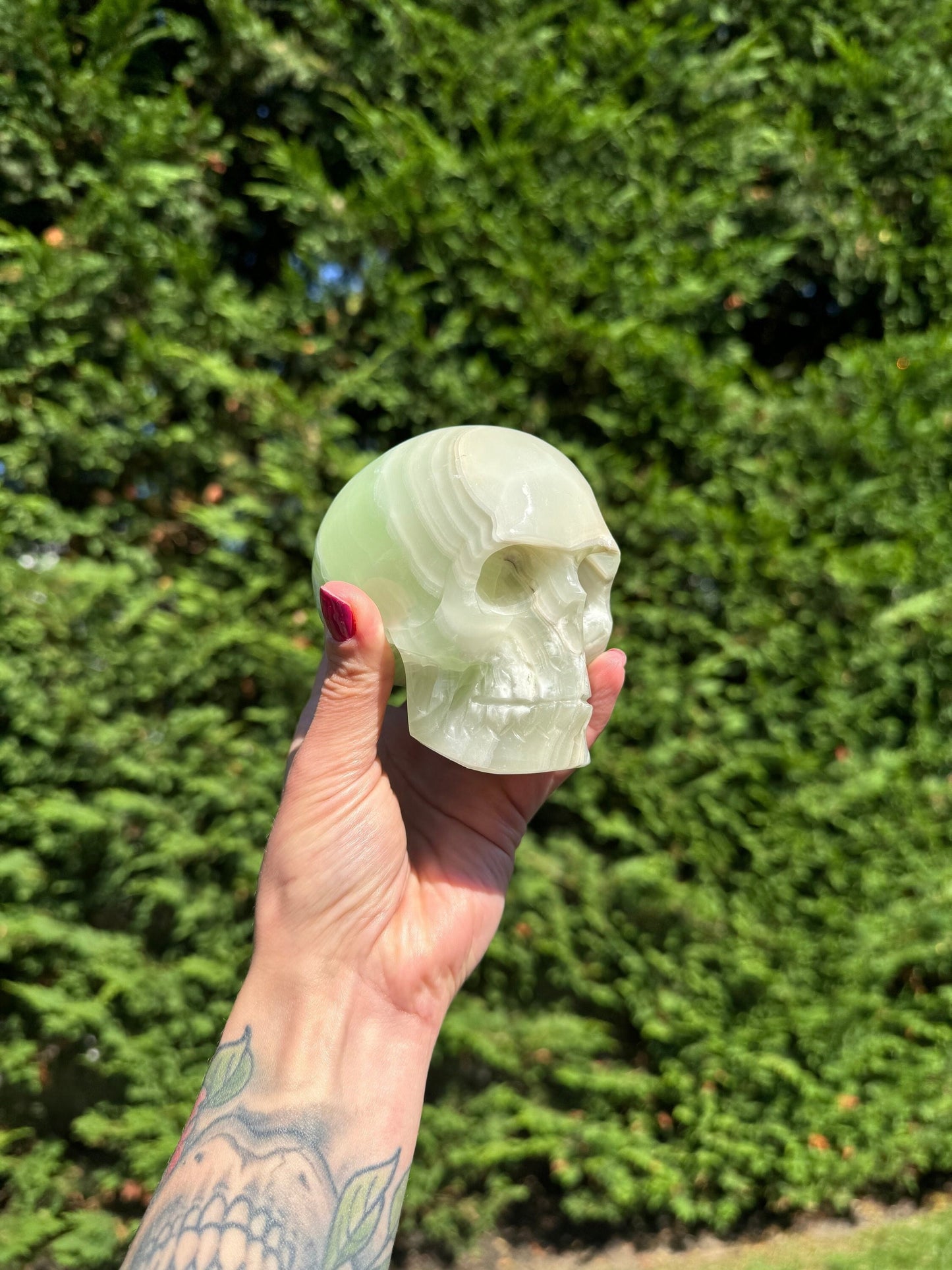 Banded Green Calcite Skull Carving (4.25")