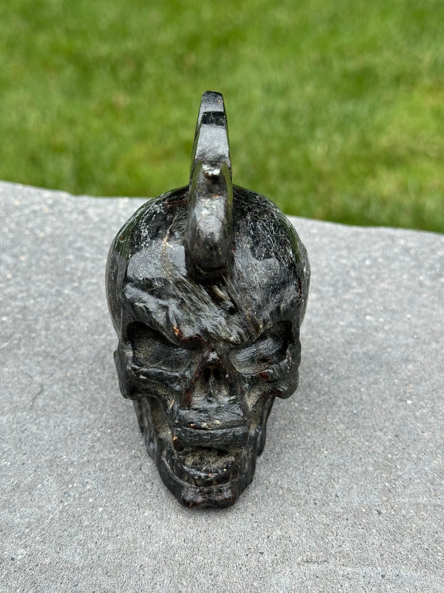 Garnet & Astrophyllite Mohawk Skull Carving (3.45")