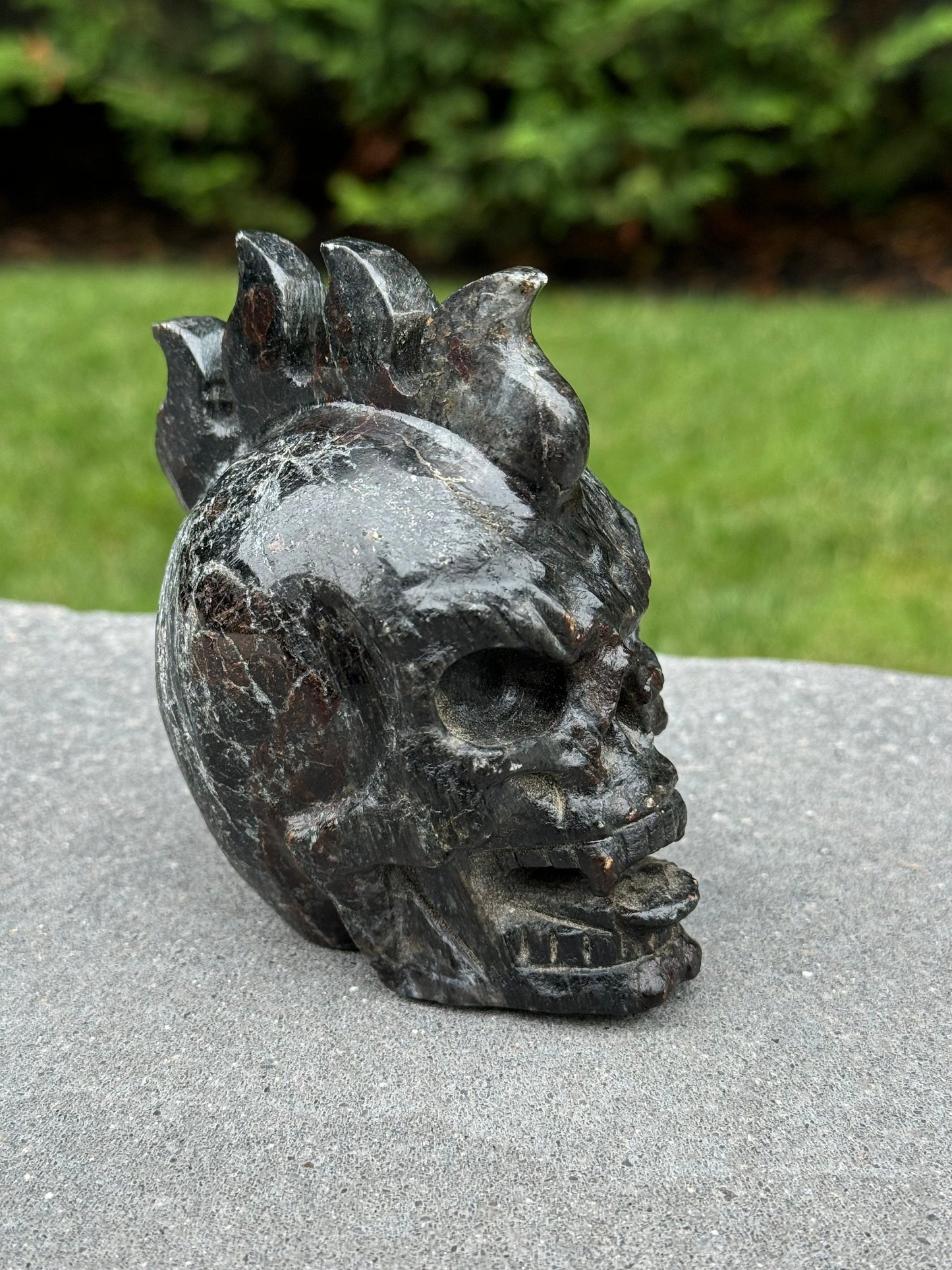 Garnet & Astrophyllite Mohawk Skull Carving (3.45")