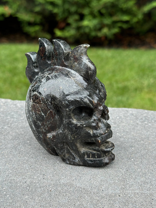 Garnet & Astrophyllite Mohawk Skull Carving (3.45")